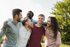 A diverse group of individuals sitting in a circle, participating in group therapy, symbolizing the importance of support networks in addiction recovery.