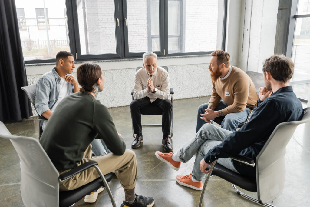 Group therapy session during benzodiazepine addiction treatment after detox