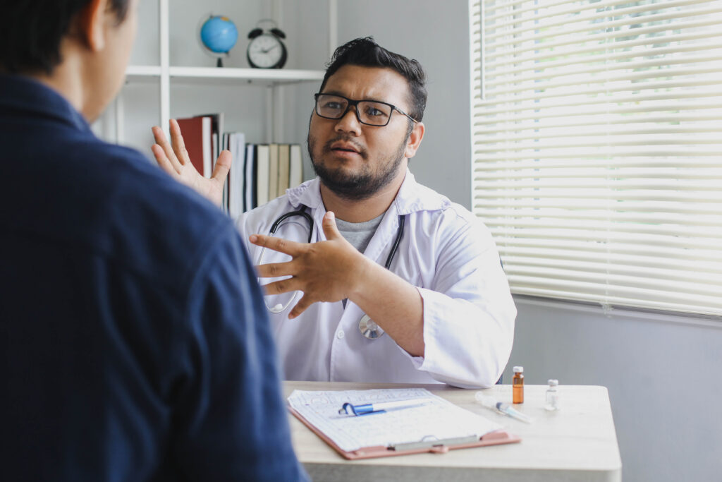 Man discussing benzodiazepine prescription concerns with his doctor
